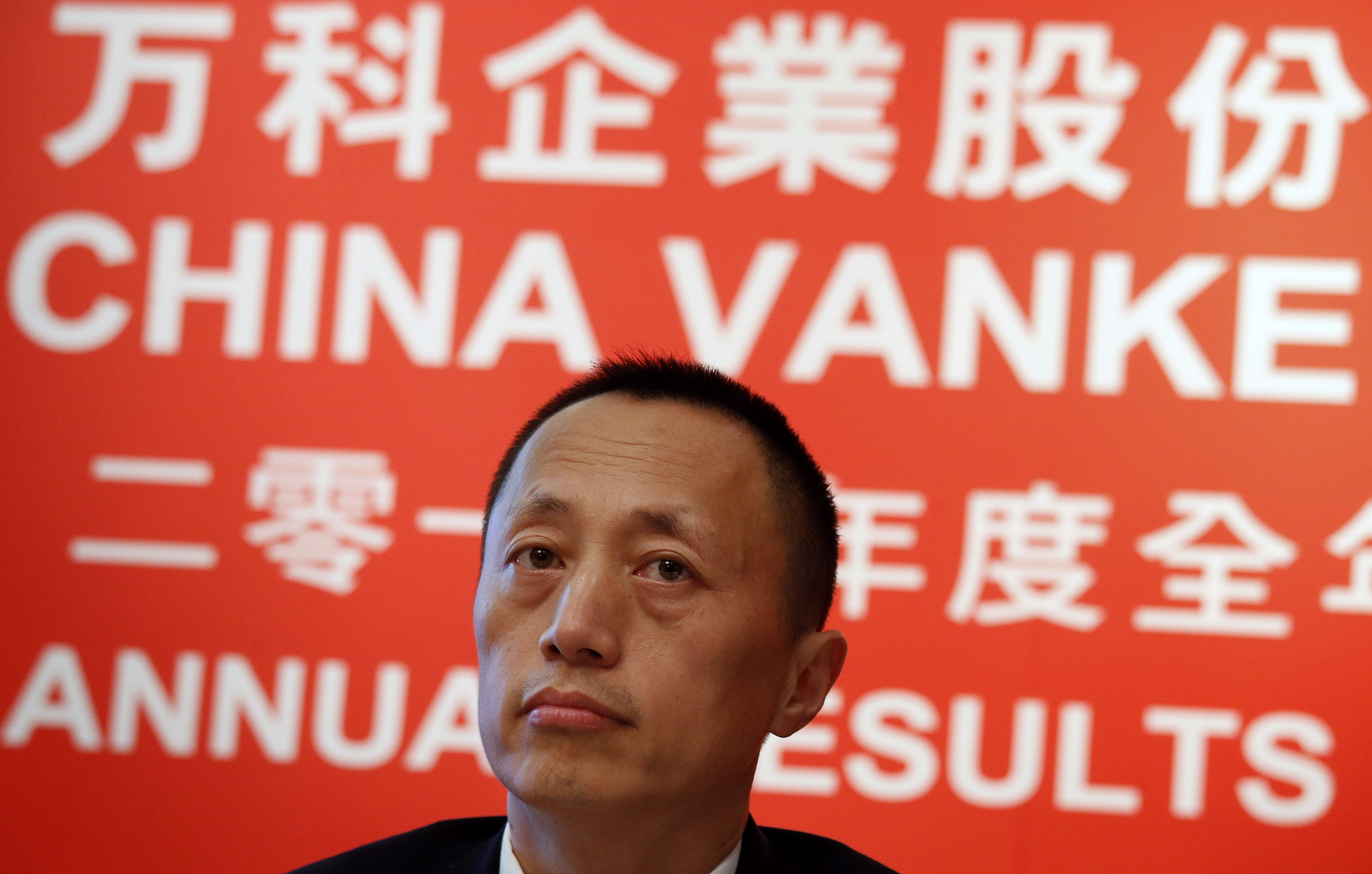President of China Vanke Co Ltd Yu Liang attends a news conference in Hong Kong